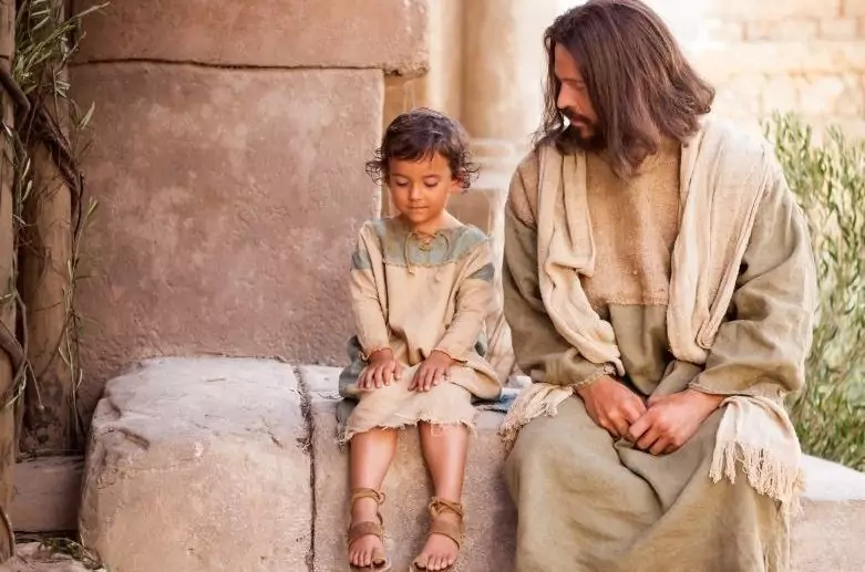 Jesus conversando com uma criança